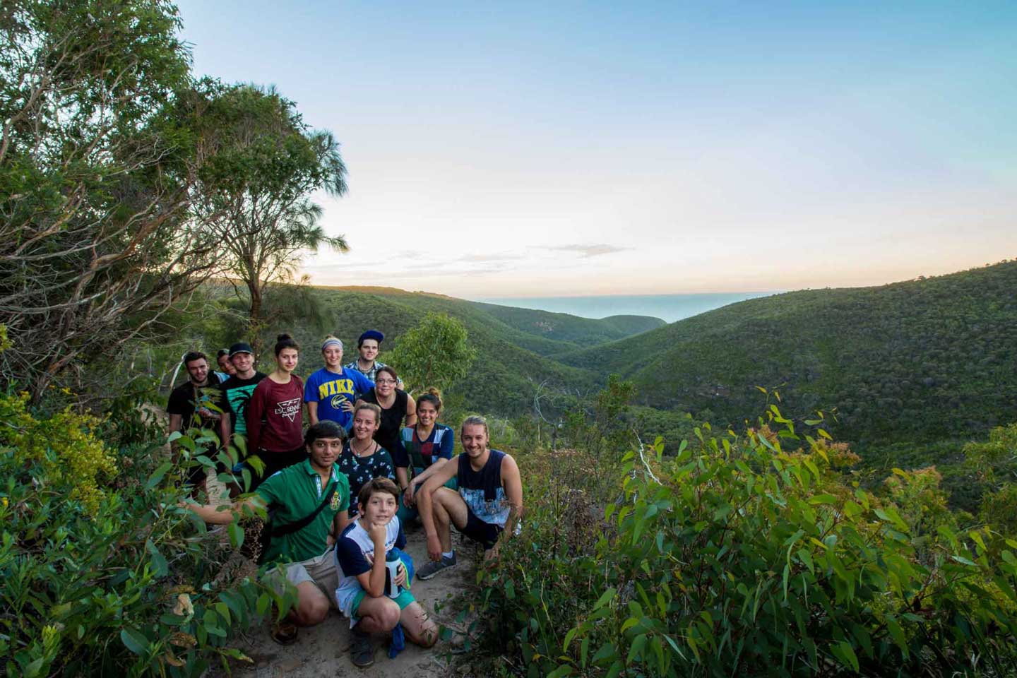 Students in a group photo while hiking